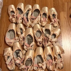 9 pairs of dead pointe shoes